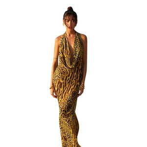 Sexy backless leopard print maxi dress with halter neckline for summer beach parties