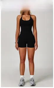 Detail view of premium black halter yoga top and high-waisted compression shorts set