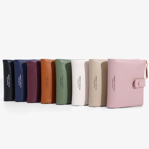 Short minimalist PU leather wallet for women in multiple colors with snap button closure