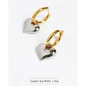 Vintage style two-tone heart drop earrings in gold and silver finish with mirror polish