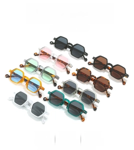 Matrix display of vintage thick frame hexagonal sunglasses in eight diverse color options