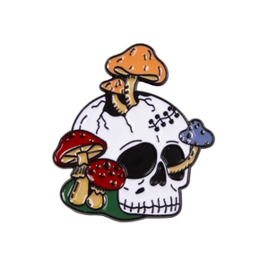 Gothic punk skull brooch with colorful mushrooms and enamel finish on white background
