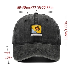 Detail of black washed denim baseball cap with sun embroidery and size specifications