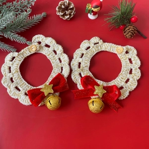 Christmas pet collar set with red bows, gold stars and bells on festive red background