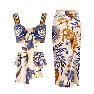 Bohemian printed two-piece set featuring crop top with knot and high slit skirt