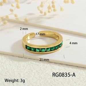 Detail view showing 4mm wide gold ring with green zircon inlay and size dimensions