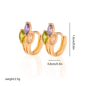 Detail view of gold huggie earrings with marquise-cut lavender, green, and clear stones