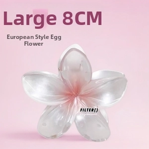 Close-up of 8cm translucent pink gradient frangipani hair claw clip made of resin