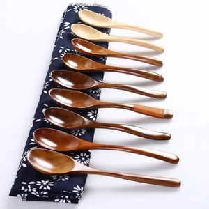 Handcrafted natural wood soup spoons with long handles and decorative thread wrap