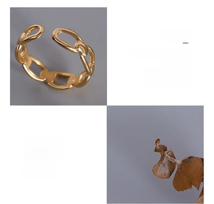 Detailed views of 18K gold plated surgical steel ring with hollow knuckle design