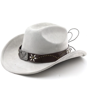 Detail of western cowboy hat band featuring eagle metal buckle and rivet embellishments