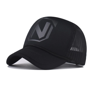Black trucker hat with silver N letter logo and breathable mesh in a 45-degree angle view