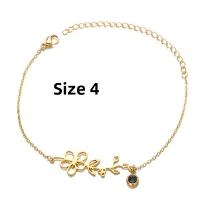 Detailed view of Style 4 golden birth flower bracelet with dark gemstone and adjustable chain