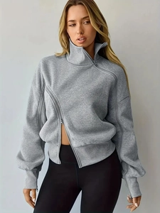 Grey high neck sweatshirt with asymmetrical diagonal zippers and loose-fit drop shoulders