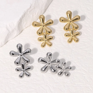 Minimalist double layered five-petal flower drop earrings in gold and silver steel