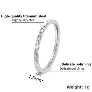 Detail showing 1.5mm thin titanium steel ring with diamond-cut texture and 1g weight