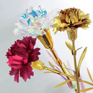 Three colorful gold foil roses in iridescent, gold, and red colors on a white background
