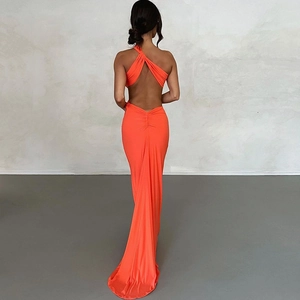 Detail of neon orange evening dress with ruched back and elegant cross back straps
