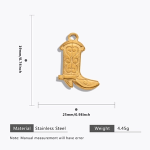 Golden stainless steel cowboy boot pendant with heart scrollwork, 19mm x 25mm size