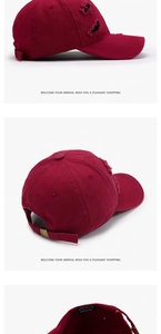 Detail view of distressed burgundy cotton baseball cap with adjustable metal buckle closure