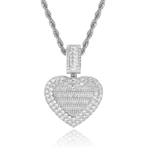 Detailed view of silver heart pendant with cubic zirconia and twisted rope chain