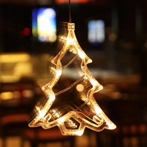 Christmas tree shaped LED hanging light with warm yellow glow for holiday home decoration