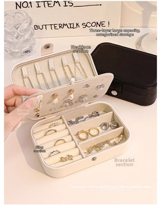 Detailed interior of portable multi-layer jewelry organizer showing hooks and slots
