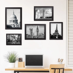 Wall-mounted minimalist black photo frame set featuring world-renowned architectural landmarks