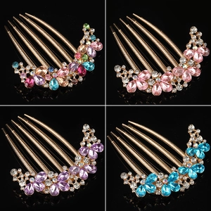 Vintage style gold hair combs with colorful rhinestones and flower designs