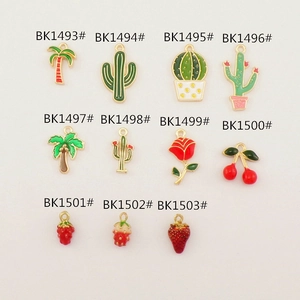 Assorted DIY alloy enamel charms featuring tropical plants and fruits with gold accents