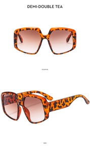 Front and side views of oversized leopard print sunglasses with brown gradient lenses