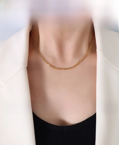 Detailed view of 3.0mm gold-plated titanium steel necklace with geometric faceted links