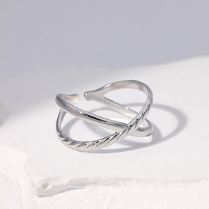 Minimalist silver stainless steel crossover open ring with an adjustable band design