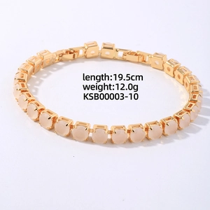Detail of 19.5cm gold beaded bracelet with inset white stones and adjustable clasp