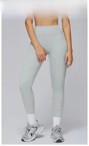 Close-up of heather gray high-waisted yoga leggings showing premium athletic fabric texture
