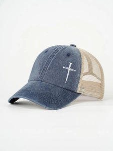 Detail of cross embroidery on vintage washed denim trucker hat with breathable mesh