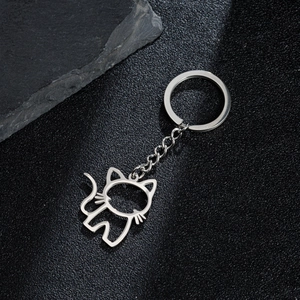 Polished stainless steel hollow cat keychain with sleek cutout feline pendant design