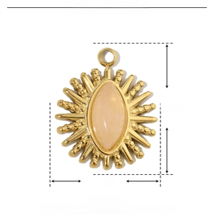 Detail of pink natural stone pendant with gold sunburst pattern and size measurements