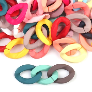Macro detail of multi-color frosted acrylic chain links for DIY jewelry making sets