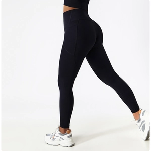 Detail view of high-waisted yoga pants with side pocket and moisture-wicking fabric