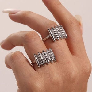 Sparkling geometric zircon square ring in silver finish with vertical bar design on model's hand