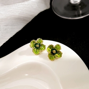 French style silver needle flower stud earrings with green crystals and gold base