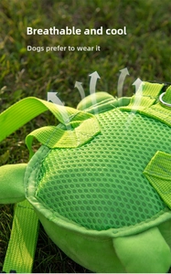 Macro view of turtle-shaped pet backpack with breathable mesh and D-ring on grass