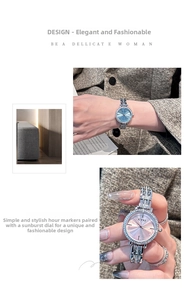 Detailed view of women's watch featuring a sunray dial, rhinestone bezel and mesh steel band