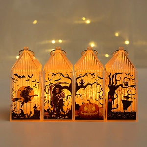 Set of four Halloween pumpkin lanterns with warm orange glow and witch silhouette patterns