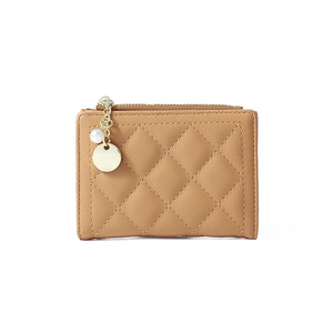 Close-up of light brown quilted PU leather wallet with pearl and gold chain zipper detail