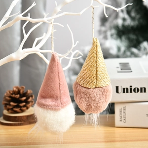 Set of two plush Christmas gnomes in pink velvet and gold straw texture with white faux fur