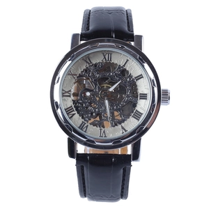Macro view of skeleton mechanical watch dial with Roman numerals and silver case