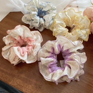 Set of four floral lace scrunchies in sea salt blue, pink, yellow and purple tones