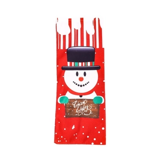 Christmas snowman wine bottle cover with Warm Wishes print and red white striped drawstring
